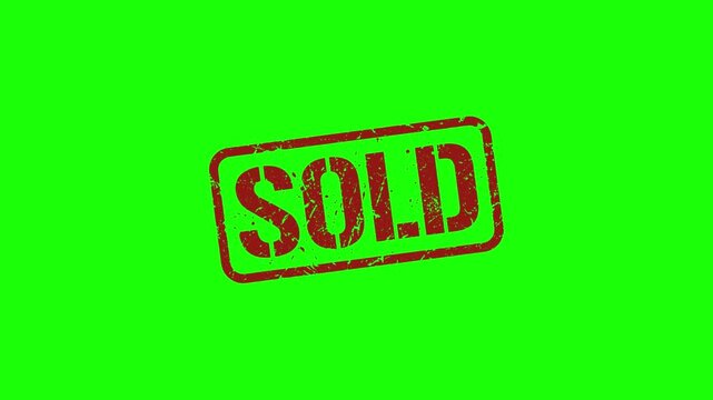 Red sold stamp on green background for marking sold items quickly