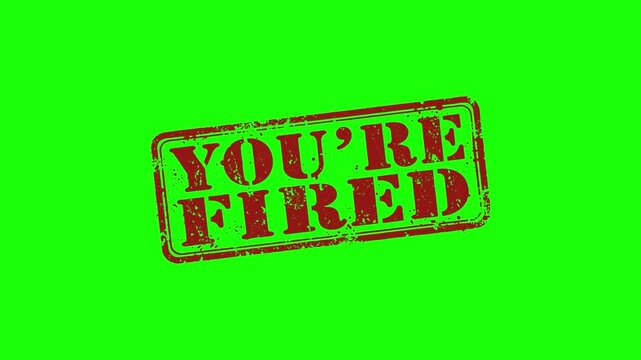 Red grungy stamp with text youre fired on green background