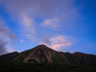 Fototapeta premium Calm Light Over Rugged Mountain
