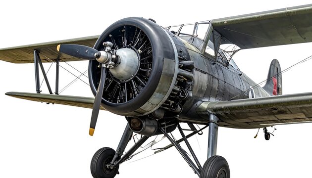 Close-up of a vintage biplane isolated on white, showcasing its radial engine, propeller, and intricate details