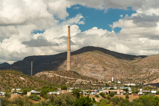 USA, Arizona, Winkelman.  Tall smoke stack towers over the town.  It is the tallest free standing structure in Arizona, and is part of the copper smelting in the neighboring town of Hayden, Arizona