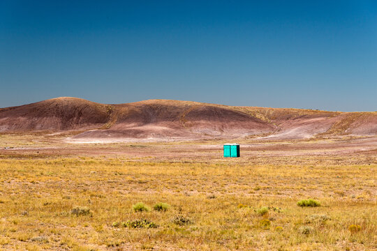 USA, Arizona, St Johns.  Blue portable toilets in the middle of the desert.