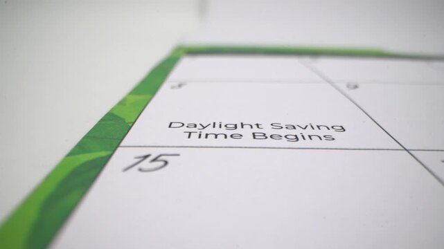 Close up of calendar showing Daylight Saving Time begins.