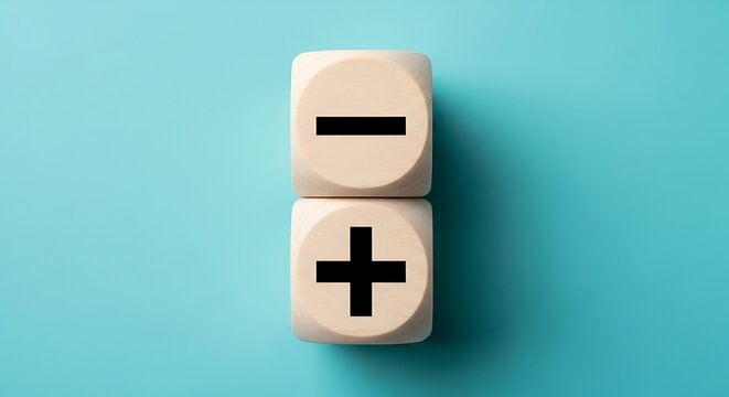 Minimalist wooden blocks with plus and minus symbols, positive and negative concept on blue background, mathematical icons on wood cubes