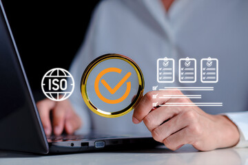 Business using magnifying glass to inspect ISO compliance and quality assurance checklist audit process, certification standards, risk control, and digital workflow validation in corporate management