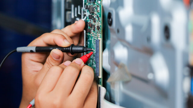 Electronics technician, electronic engineering electronic repair,electronics measuring and testing, repair and maintenance concepts.