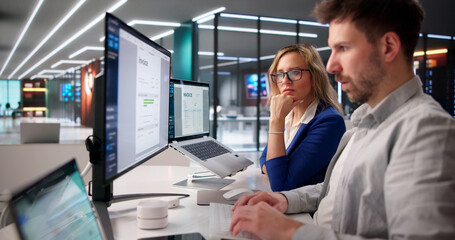 Business Professional Analyzing Digital Invoice On Laptop