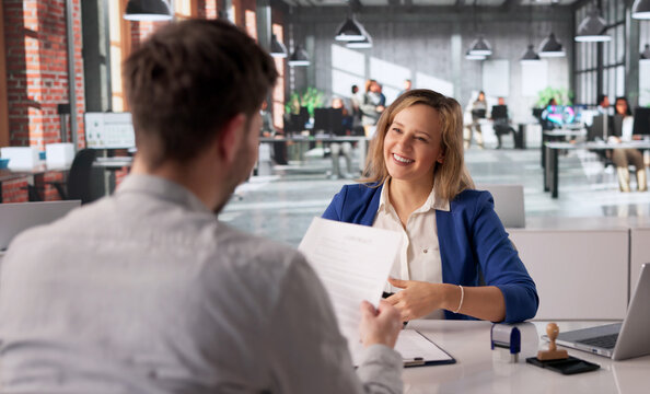 Female Notary Public Diligently Validating Property Papers