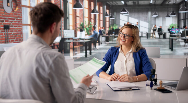 Vehicle Registration Agent Thoroughly Verifies New License Plate