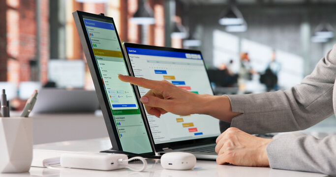Office Manager Reviews Project Timeline