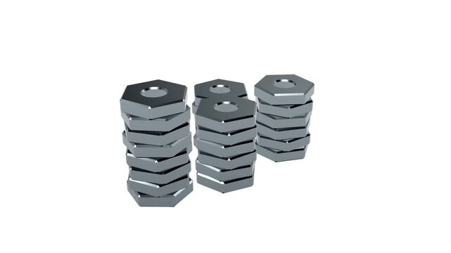 spinning stacks of hex nuts on white background video
