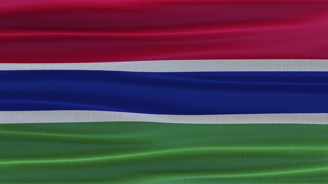 Gambia flag waving in the wind with high quality fabric texture