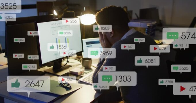 Male analyst analyzing finance charts on monitor while notifications multiplying, covering eyes