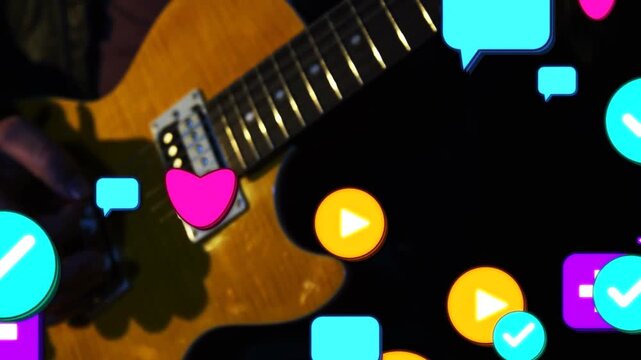 Musician playing guitar neck, plucking strings, sparking hearts, play icons obscuring hands