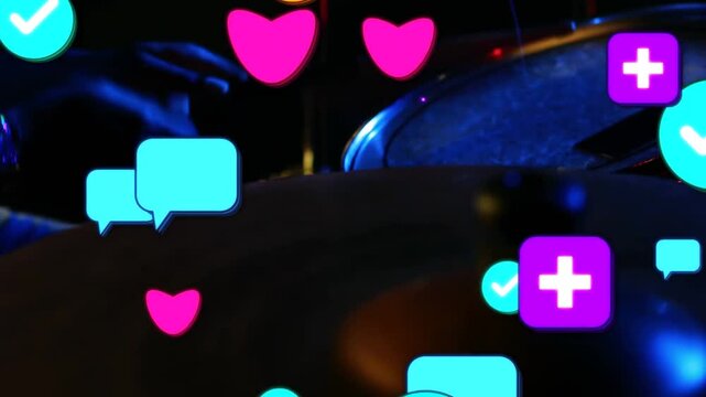 Vertical video: Striking drumstick tapping cymbal on stage, drummer's hands spawning rising icons