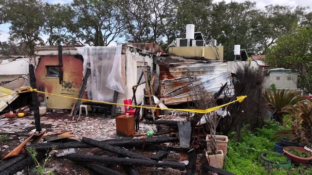 Aerial Kfar Aza burned house aftermath Israel

Drone footage burned home destruction aftermath Kfar Aza Israel October 7 2024
