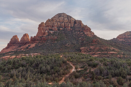 Rugged rock formation in wide wilderness landscape