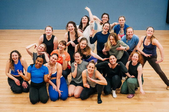 Diverse group of women dancing having fun in studio