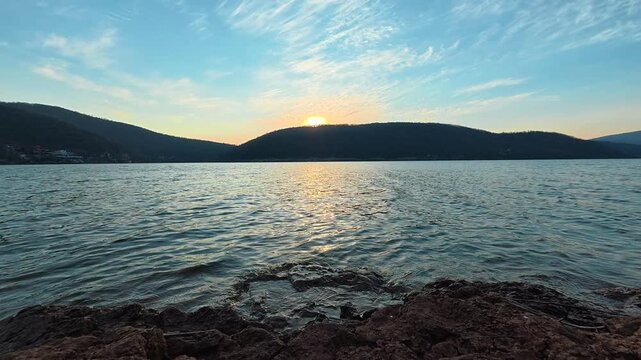 Static Lake Shot with Red Earth Shore &ndash; Sunset Reflections, Autumn Evening. Location: Bovan Lake. Balkans, Serbia.