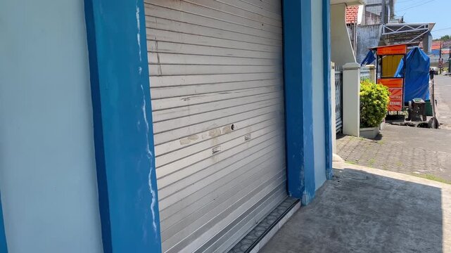 Closed Metal Roller Shutter on Retail Storefront