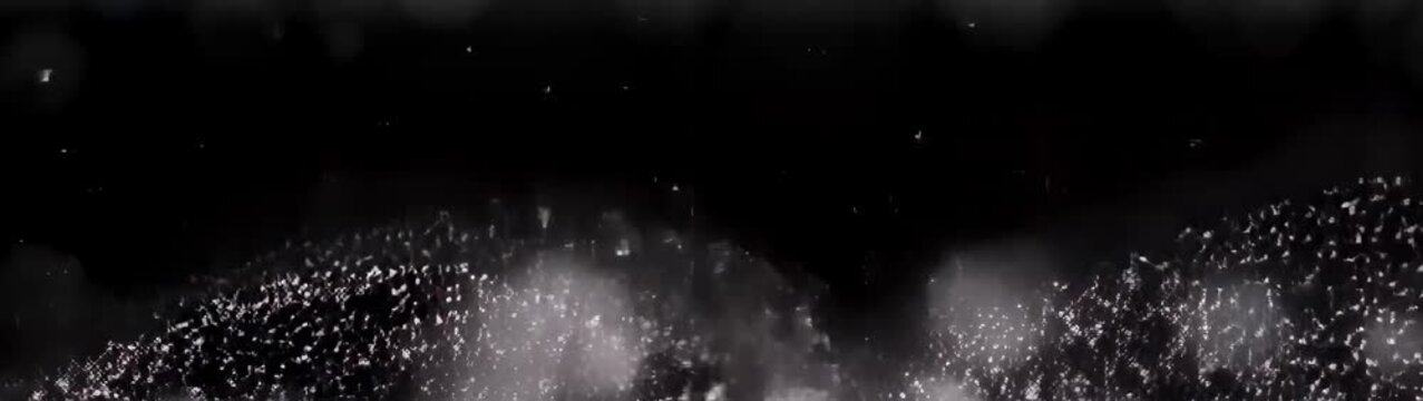 A close-up of a white light in a dark room