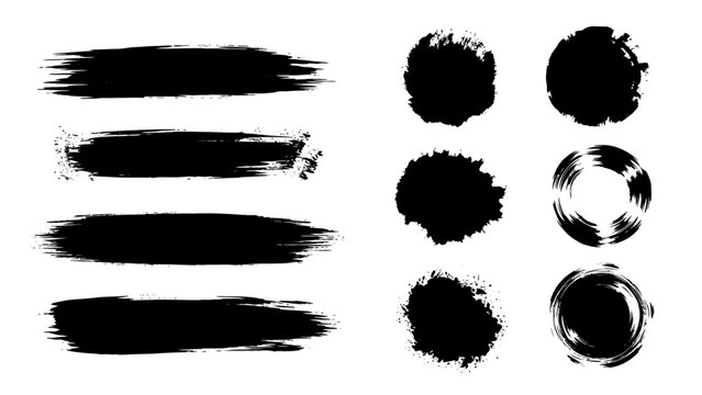 black grunge brush strokes and ink splatters create abstract artistic textures on a white background perfect for creative design projects.