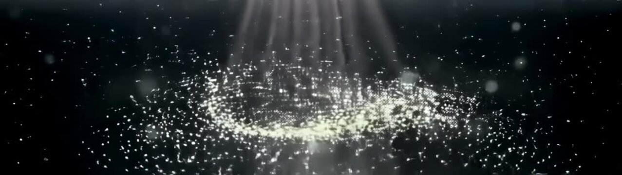 A large group of small white lights in a dark room