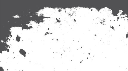 Fototapeta premium Distressed dark gray and white grunge texture with scattered rough particles and uneven edges