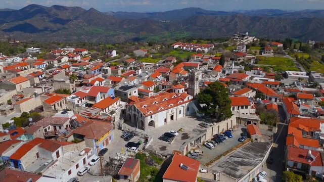Aerial Orbit of Orthodox Church Dome and Bell Tower in Pano Lefkara Village Cyprus