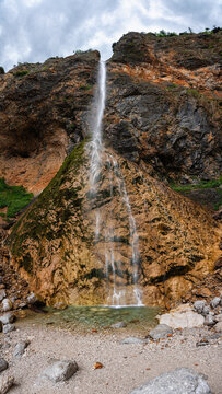 Rinka waterfall in the beautiful Logar Valley in Slovenia during summertime.