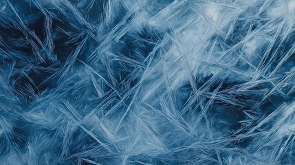 Obraz premium Ice texture with cracks, abstract background featuring transparent blue winter ice, perfect for use in cold-themed designs, nature visuals, or as a backdrop for text.