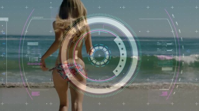 Woman taking step and picking up pace toward shore, HUD tech tracking torso, rotating readouts
