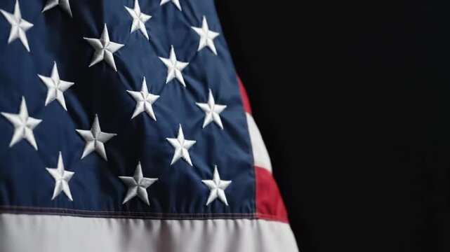 American flag with stars and stripes on black background