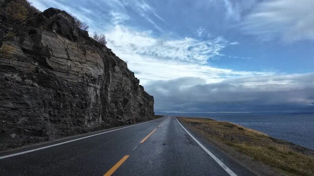 Driving along the scenic coastal road to Nordkapp in Norway