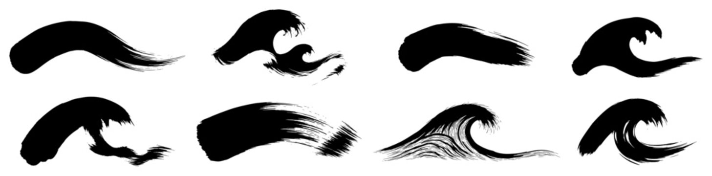 Ocean waves set created with ink brush strokes in traditional calligraphic style