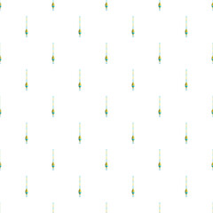 Repeating pattern of yellow and green fishing floats arranged on white background © nsit0108