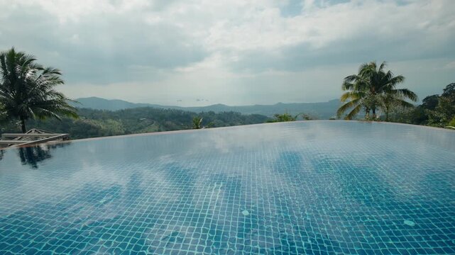 Infinity pool with panoramic tropical mountain and sea view Koh Samui Thailand