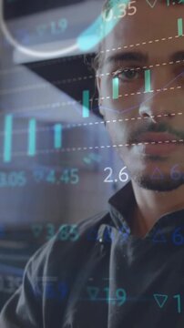 Vertical video: Man in jacket uncrossing as camera rising, market candles over face analyzing data