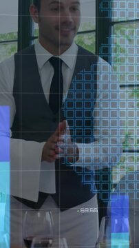 Vertical video: Server placing plates and showing dishes in restaurant, causing blue chart overlay