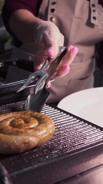 Juicy sausages grilled on the grill