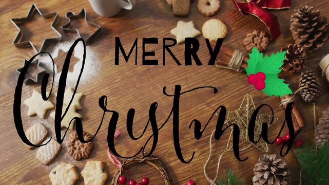 Animation of merry christmas text over christmas cookies and decorations on wooden background