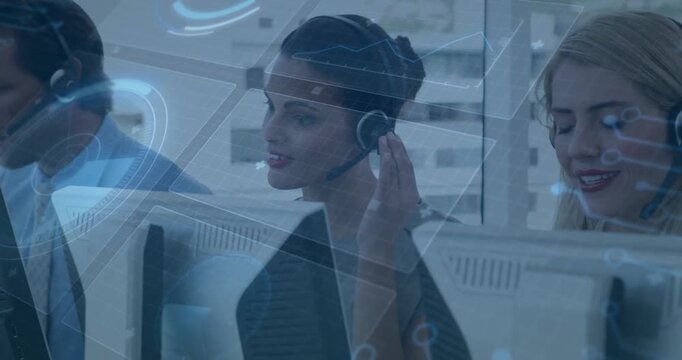Customer service representatives using animation on futuristic digital interface at work