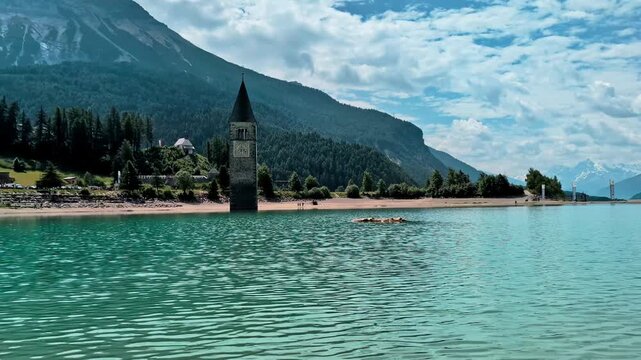 Sunken Bell Tower of Alt Graun in Lake Reschen South Tyrol Italy 4K