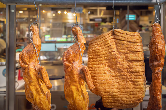 Traditional Thai Restaurant Display with Roasted Ducks and Crispy Pork Belly &ndash; A Glimpse into Thailand&rsquo;s Street Food Culture