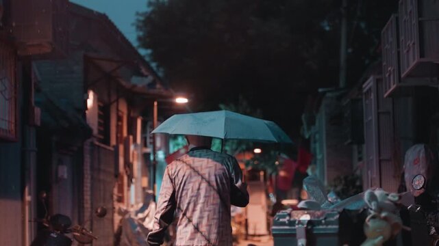 Person with umbrella walking night market alley narrow street lined with scooters and covered stalls wet pavement reflecting neon and lamp glow red flags cinematic rainy mood slow solitary silhouette