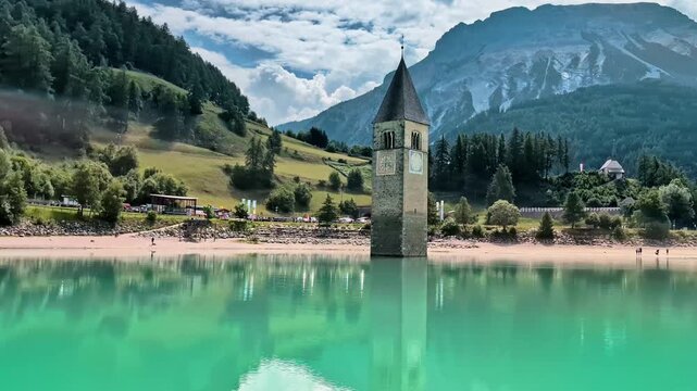 Sunken Bell Tower of Alt Graun in Lake Reschen South Tyrol Italy 4K