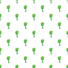 Fototapeta premium Green leafy vegetables tied in small bunches creating a seamless pattern