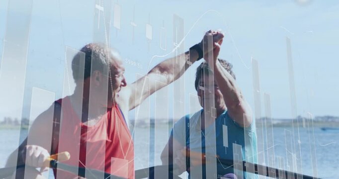 Senior man raising arm as woman returning highfives in kayak, chart overlay aiding travel designers