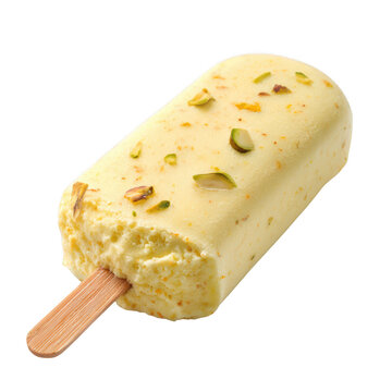 Creamy yellow kulfi ice cream with chopped pistachios on top isolated on transparent background