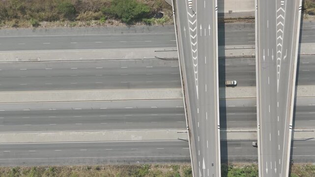 Aerial view of the rural highway with a cross bridge 